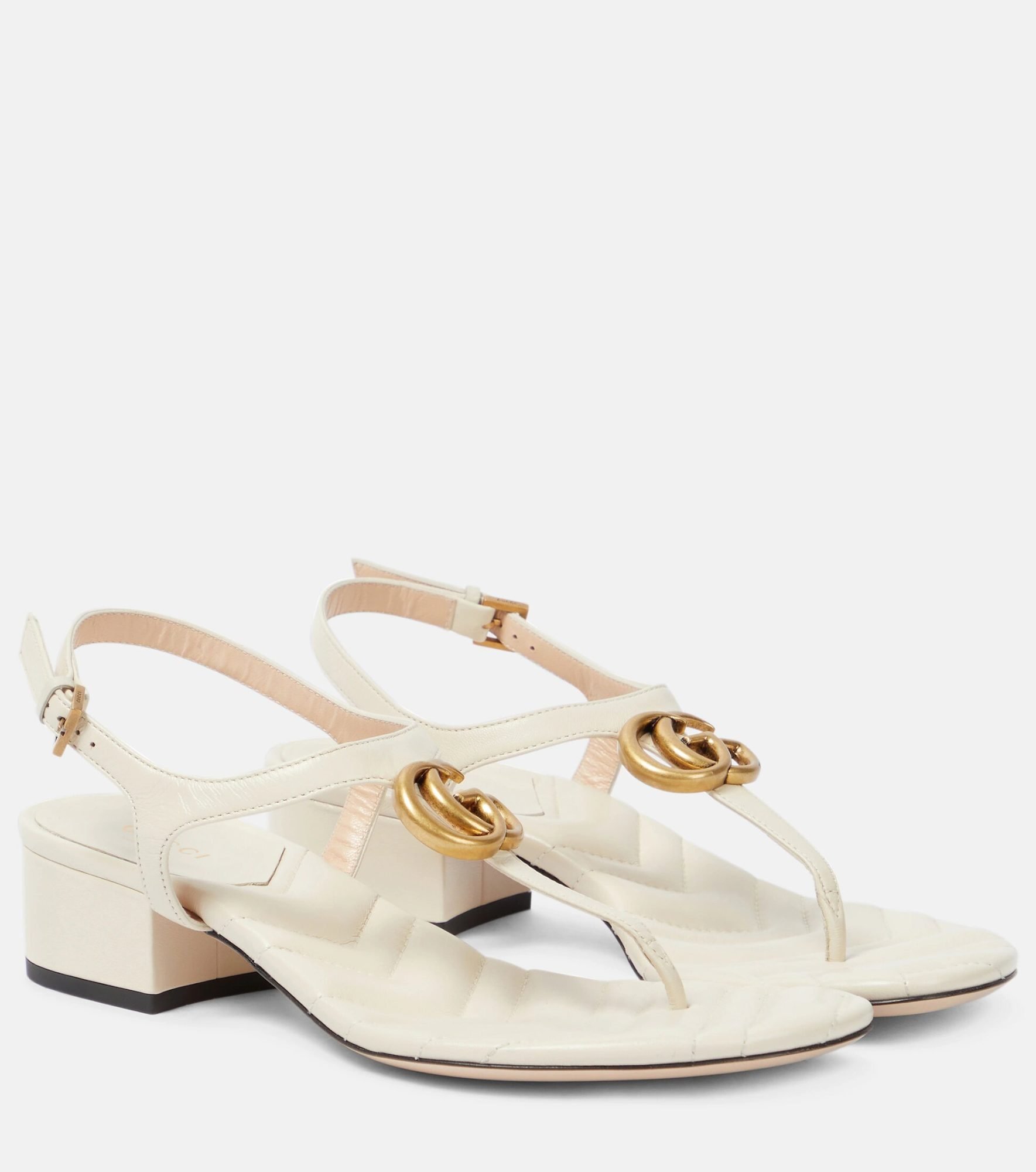 Sandalias blancas de cuero doble G de la marca Gucci