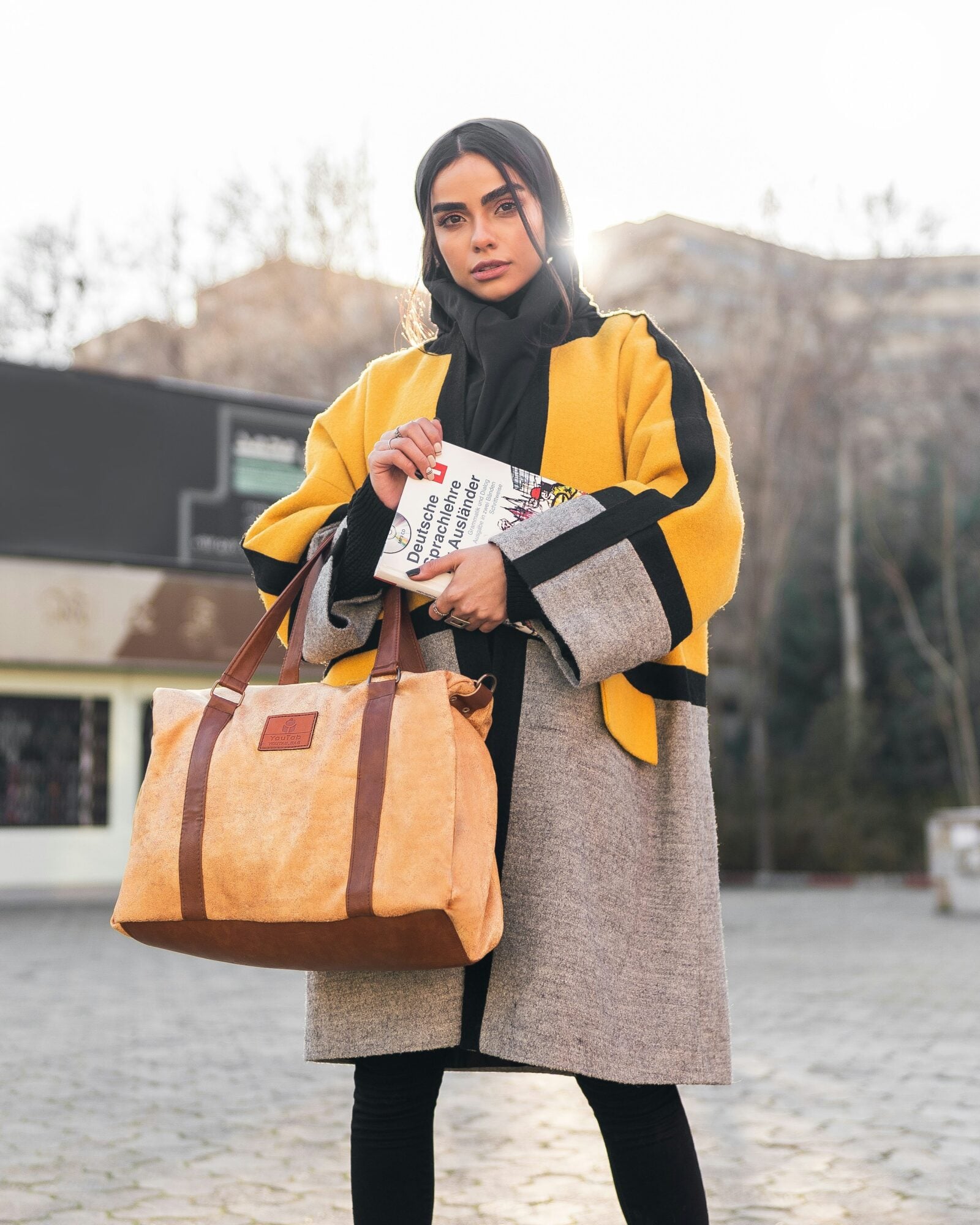 El bolso de viaje como pieza de identidad El regreso del equipaje chic a la moda contemporanea Modalova