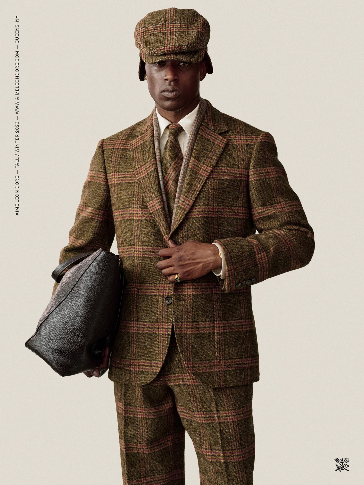 El tartán y el argyle como motivos insignia de este otoño 5 Traje, corbata y boina tartán Aimé Leon Dore