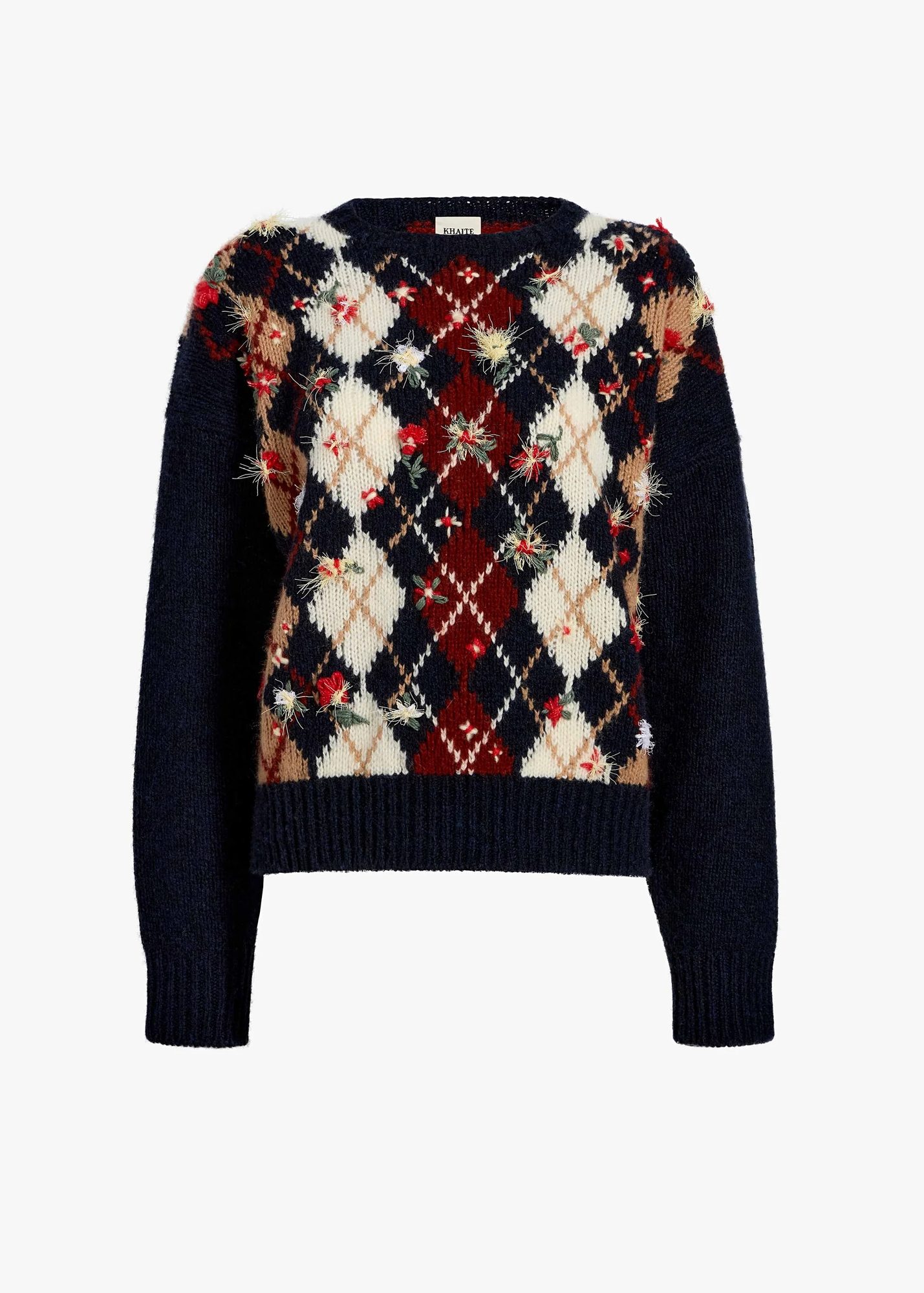 El tartán y el argyle como motivos insignia de este otoño 7 Suéter de punto motivo argyle y flores Khaite